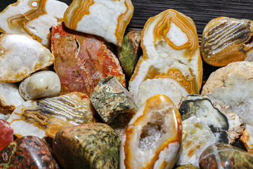 Samples of polished stones and minerals. Collection of processed stones close up