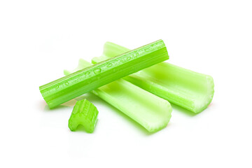Fresh Chopped Celery Sticks with Water Drops Isolated on White Background. Vegan and Vegetarian Culture. Raw Food. Healthy Diet with Negative Calorie Content