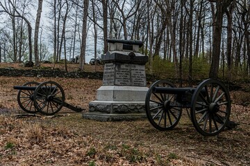 Fototapeta na wymiar Monuments and Cannon on Powers Hill, Gettysburg National Military Park, Pennsylvania, USA