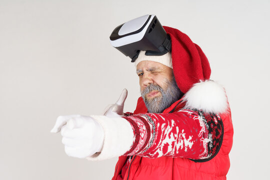 Santa Claus put on virtual glasses and shows hand gestures.