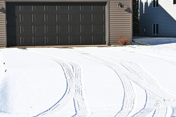 Tracks in Snow to Garage