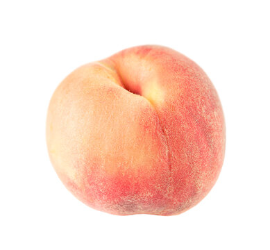 A whole peach close-up isolated on a white background.
