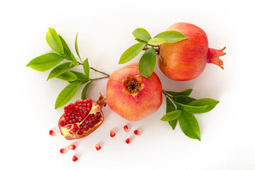 Pomegranate on white background' traditional food of jewish New Year - Rosh Hashanah. Top view