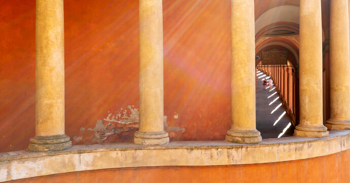 Interior view inside the Portico di San Luca, a monumental roofed arcade connecting Porta Saragozza with the San Luca Sanctuary, on Colle della Guardia in Bologna, Italy