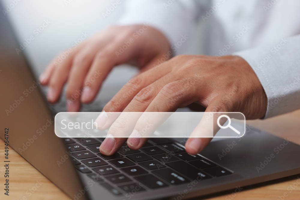 Poster Technology search engine optimization (SEO). Man hands are using a computer notebook to searching for data information. Using search console with your website.