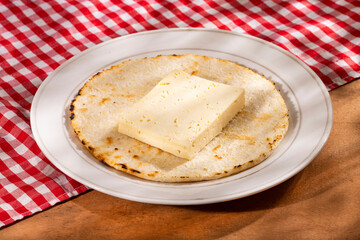 Colombian white arepa with cheese - Traditional food