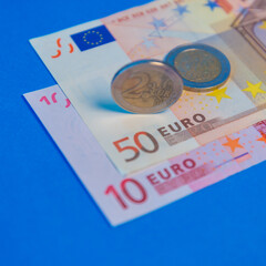 Euro bills and iron coins.