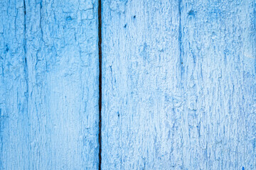 Texture of an old cracked board painted in blue. Antique. Wallpaper, background.