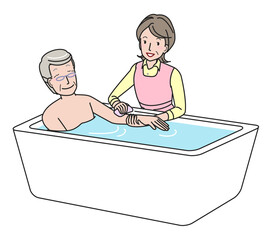 シニア男性の入浴介助をする中高年の女性
