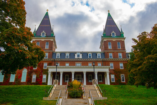 Fenwick Hall In College Of The Holy Cross With Fall Foliage In City Of Worcester, Massachusetts MA, USA.