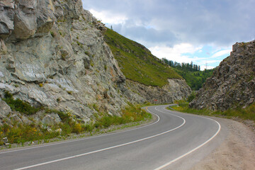 winding road through the pass in the mountains