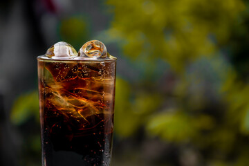 glass of cola with ice