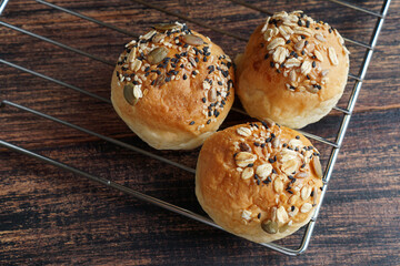 Homemade soft bread mixed with coarse wheat, cheese and a sprinkling of mix seeds and muesli       ...