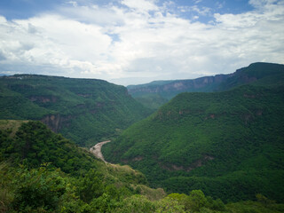 Green canyon with a river
