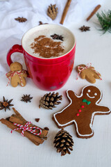 Homemade festive beverage and pastries. Hot Chocolate Cinnamon Drink and Gingerbread Cookies.