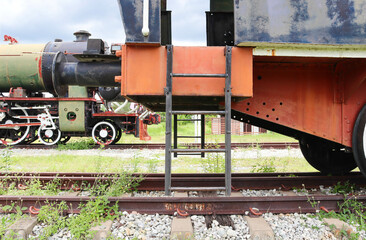 Ladder of Antique train or Ancient railway steam locomotive from Hanomac Germany on the tracks at the museum