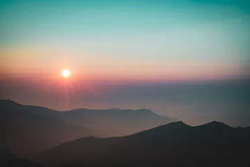 Fototapeten Sonnenaufgang über den Bergen © Misael