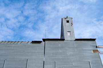 The roof of a grain elevator with metal siding in southeastern Washington, USA