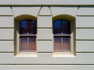 Fototapeta na wymiar Paired segmental arched windows on an historic building located in Dayton, Washington, USA