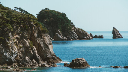 Gamow Peninsula, where the pines hang from the cliffs above the sea