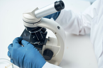 female laboratory assistant microscope research biotechnology nothing