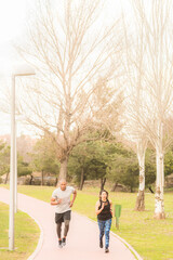 Fitness couple running in the park
