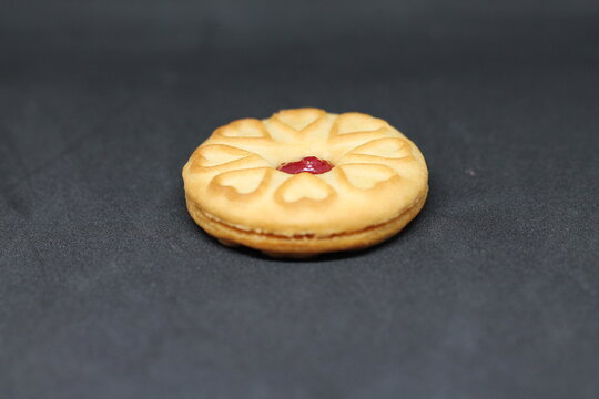 a sweet biscuit with chocolate jam