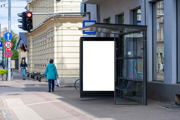 bus stop with an empty poster mockup, template of an advertising banner on the stop of transport