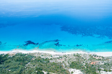 View from above on beautiful coast with aqua blue water Lefkada Ionian island, Greece.