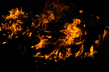 fire in the fireplace at night. fire with dark background