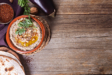 Esme, baba ganoush from baked eggplant with sesame paste with eggplant, spices and walnuts and herbs