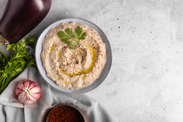 Baba ganoush from baked eggplant with sesame paste with ingredients