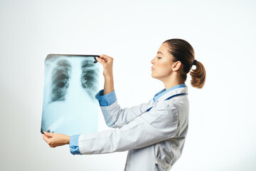 nurse white coat x-ray diagnostics hospital light background