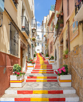 Calle Puchalt is a narrow alley in Calpe downtown with the staircase painted in the colors of the Spanish flag.Costa Blanca, Spain