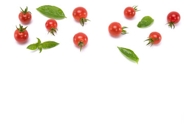 Top view of mini tomatoes and basil leaves isolated on white background
