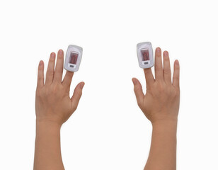 Focus at Pulse oximeter on index finger  for examination of the lung disease,checking for Coronavirus COVID-19 infection from oxygen saturation at home,measuring heart rate (pulse) on background.Clipp