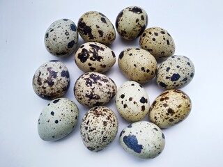 In Bangladesh, quail eggs on white background 