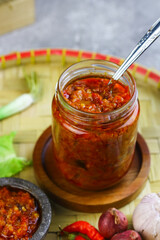 Sambal Terasi Masak or Indonesian traditional chili paste, made from chilies, tomato, garlic, shallot and some spices. 