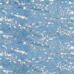 The sea sparkles in the sun. Seamless water background - 449516515