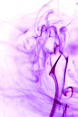 Fototapeta na wymiar Purple smoke on white backgrounds.