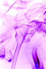 Fototapeta na wymiar Purple smoke on white backgrounds.