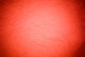 Crumpled red paper background.