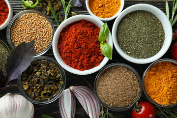 Concept of aromatic spices on rustic wooden table
