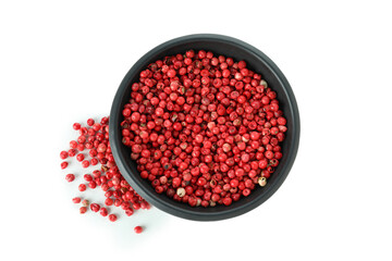 Black bowl of red peppercorns isolated on white background