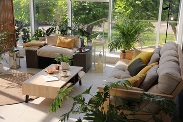 Indoor terrace interior with modern furniture and houseplants