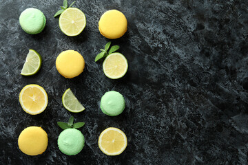 Concept of tasty dessert with macaroons on black smokey background