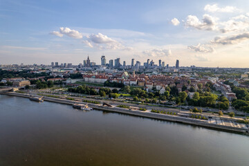 Fototapeta premium Warsaw during the day. Busy city seen from above on a beautiful sunny day. The largest city in Poland, shown in a wonderful way.