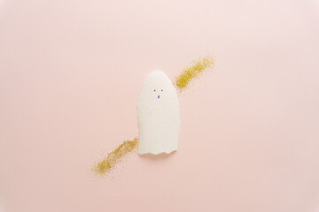 Creative design of white ghost and gold glitter.
