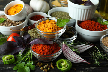 Concept of aromatic spices on rustic wooden table