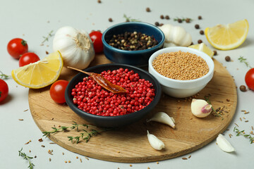 Concept of aromatic spices on light gray background